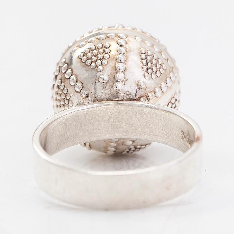 A set of silver "Halikko treasure" necklace, bracelet, ring and earrings. Kalevala Koru, Helsinki 1965-1972.