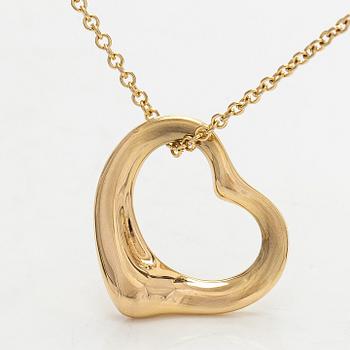 Tiffany & Co, Elsa Peretti, an 18K gold "Open Heart" necklace.