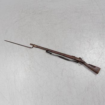 SLAGLÅSGEVÄR med bajonett, franskt konverterat m/1822 eller m/1824.