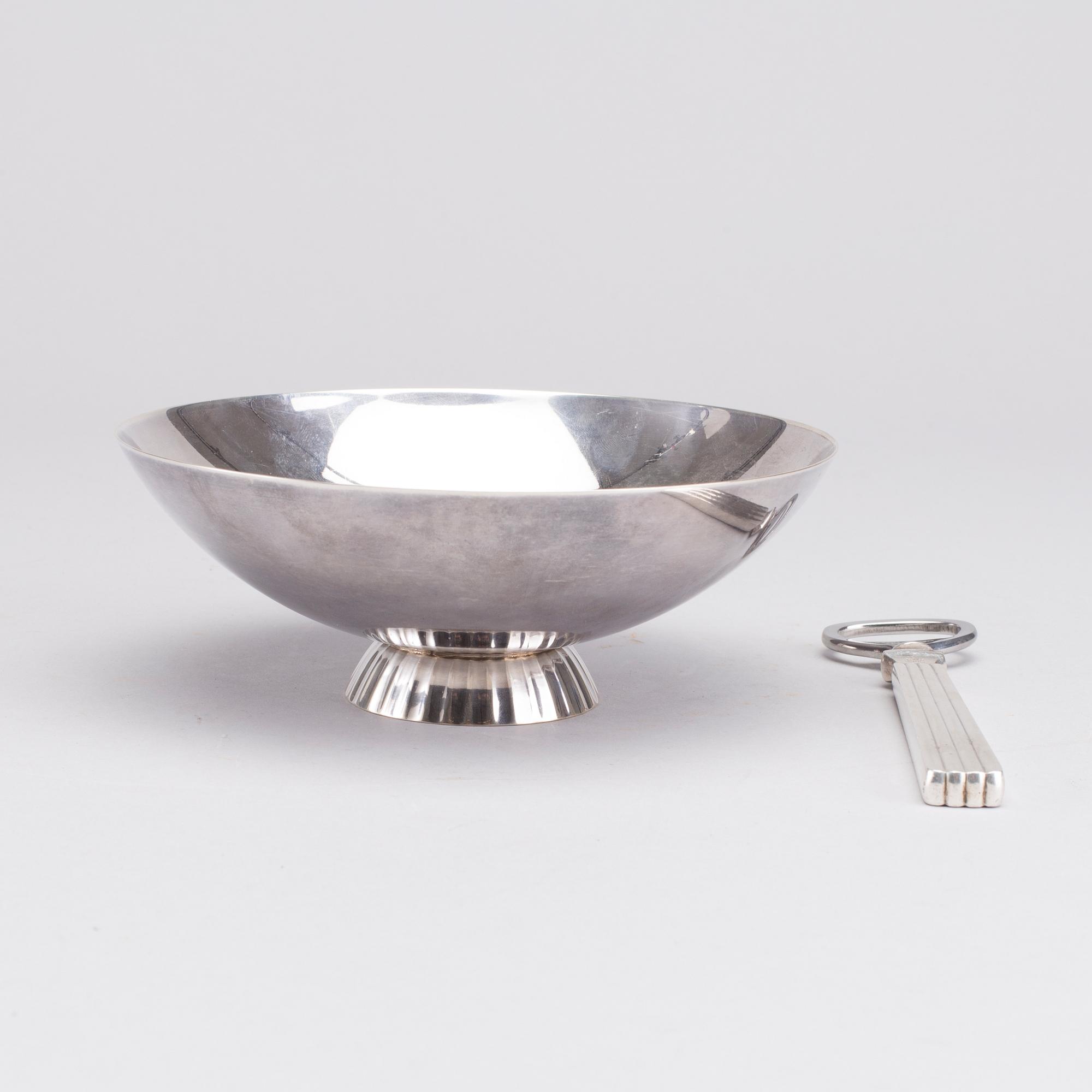 A Danish 20th century set of sterling silver bowl and opener, mark of S Bernadotte and G Jensen, weight ca 315 gr.