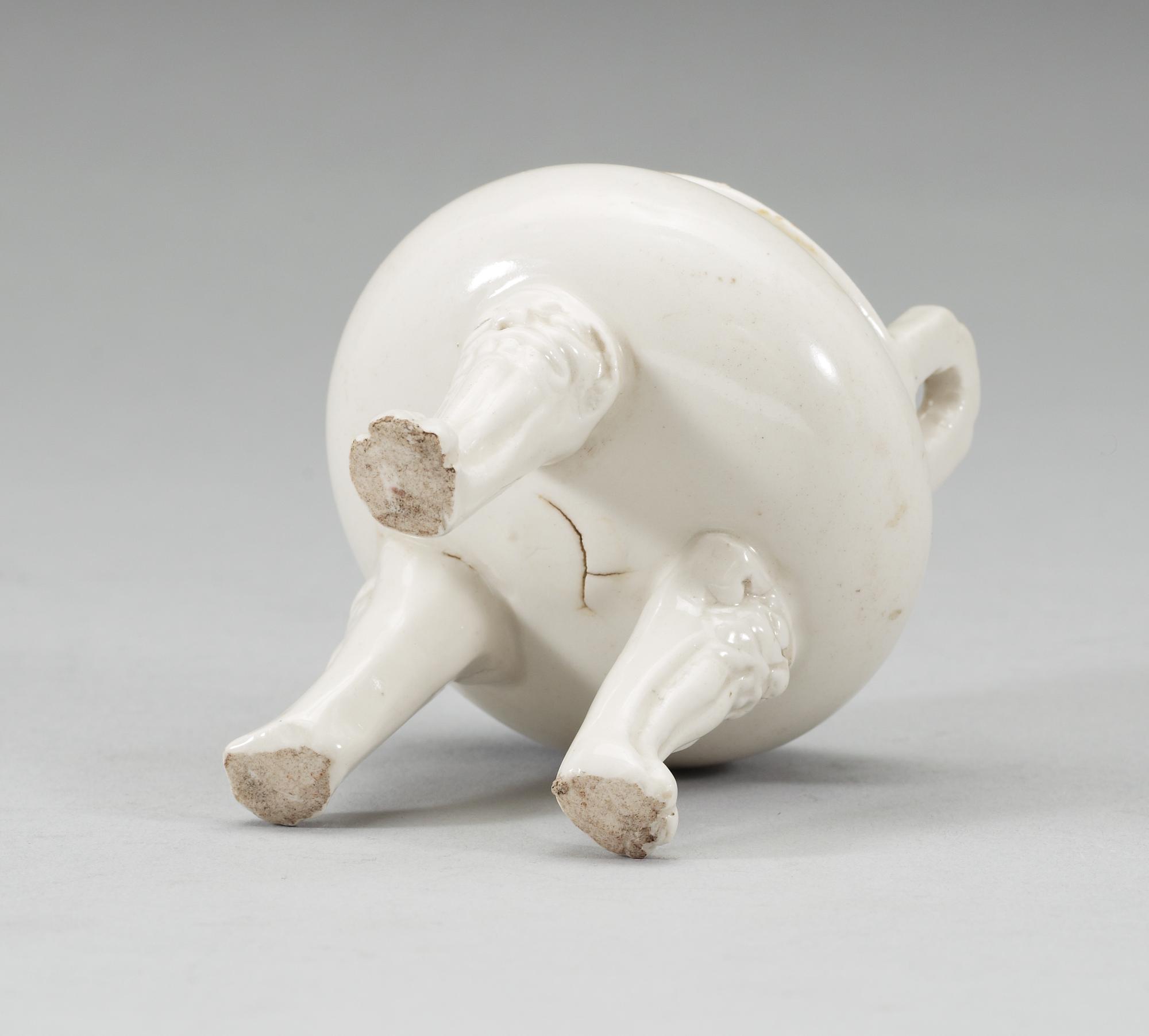 A blanc de chine miniature tripod censer, Qing dynasty, Kangxi (1662-1722).