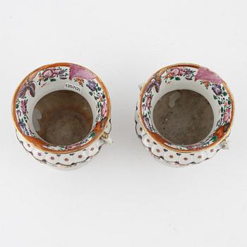 A pair of famille rose flower pots, Qing dynasty, Qianlong (1736-95).