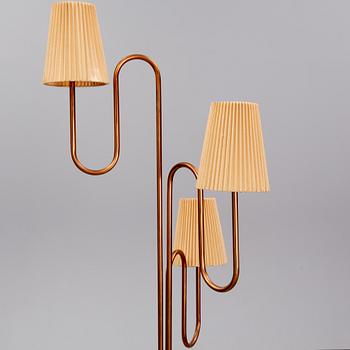 A 20th century Swedish Modern three-armed floor light.