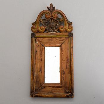 A mirror with wooden frame, 19th century.