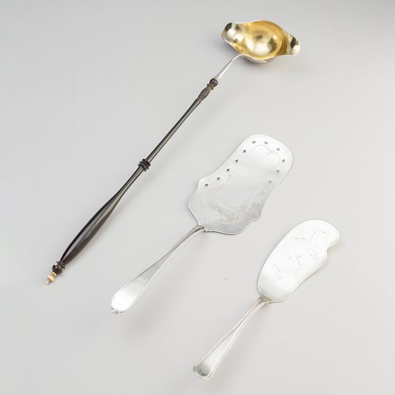 Two Silver Serving Spoons, including a Rococo-Revival spoon with mark PR Hinnerup, Denmark 1851.