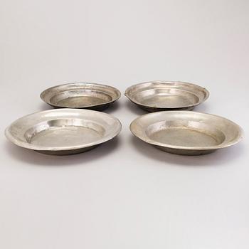 FOUR PEWTER PLATES, Sweden, amongst others Wexiö, 19th century.