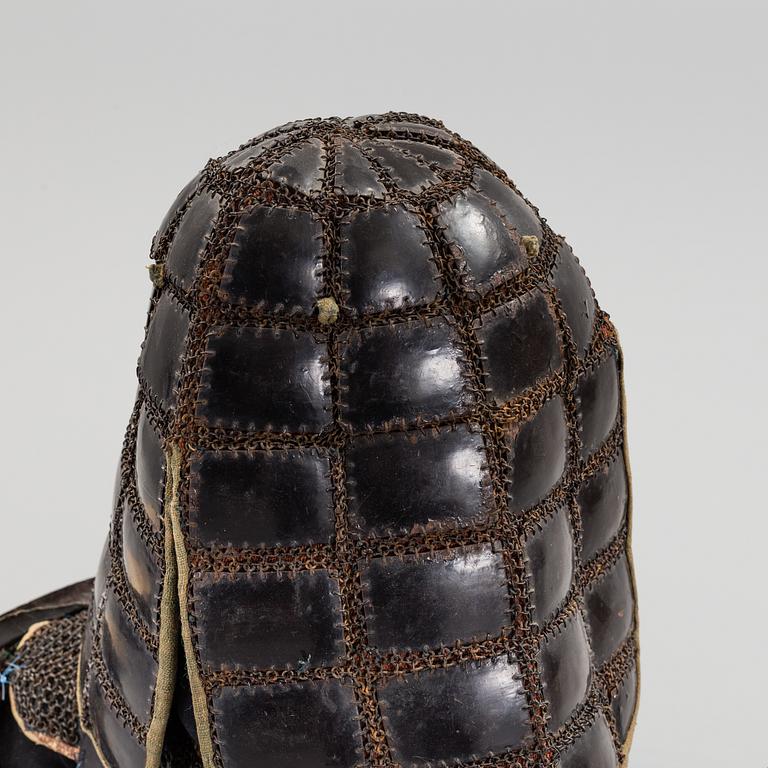 A Japanese suit of armor in the Tatami-Gusoho style, presumably mid Edo period.