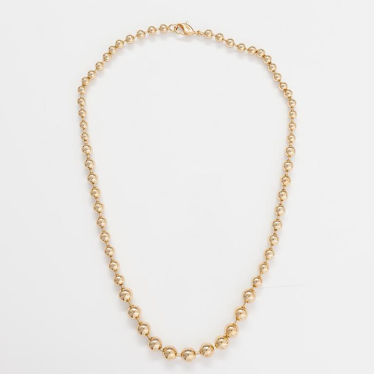 DIOR. A necklace and a pair of earrings in gold coloured metal. Marked Chr. Dior, Germany.