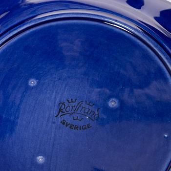 Hertha Bengtson, a stoneware bowl and twelve plates, Rörstrand, Sweden.