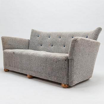 A mid-20th century sofa.
