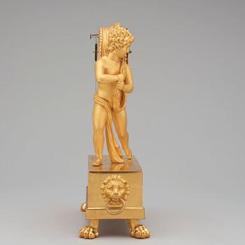 A Swedish Empire early 19th century gilt wood mantel clock by J E Callerström, master 1817.