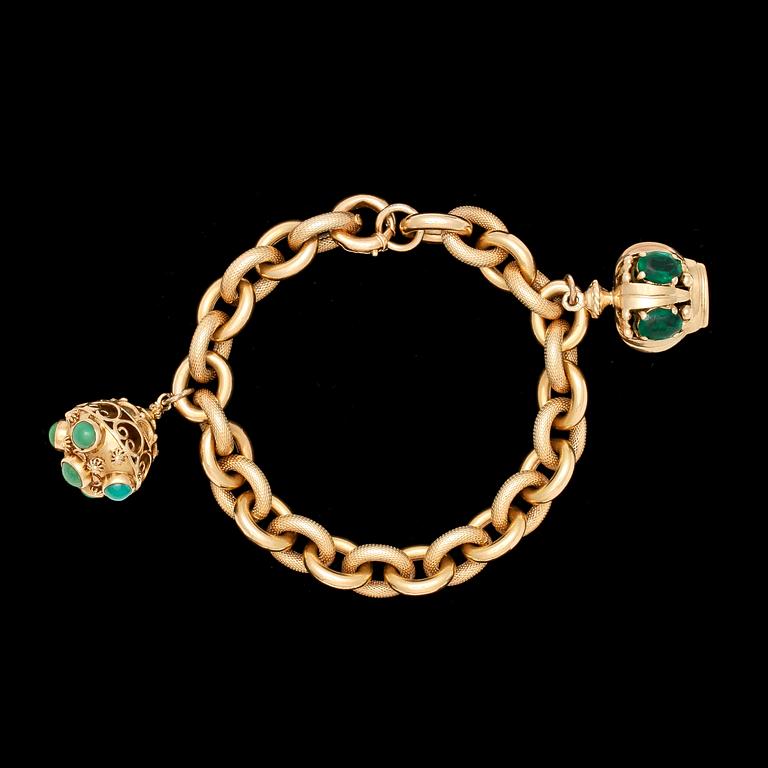 BRACELET, with two charms set with turqouise and green paste.