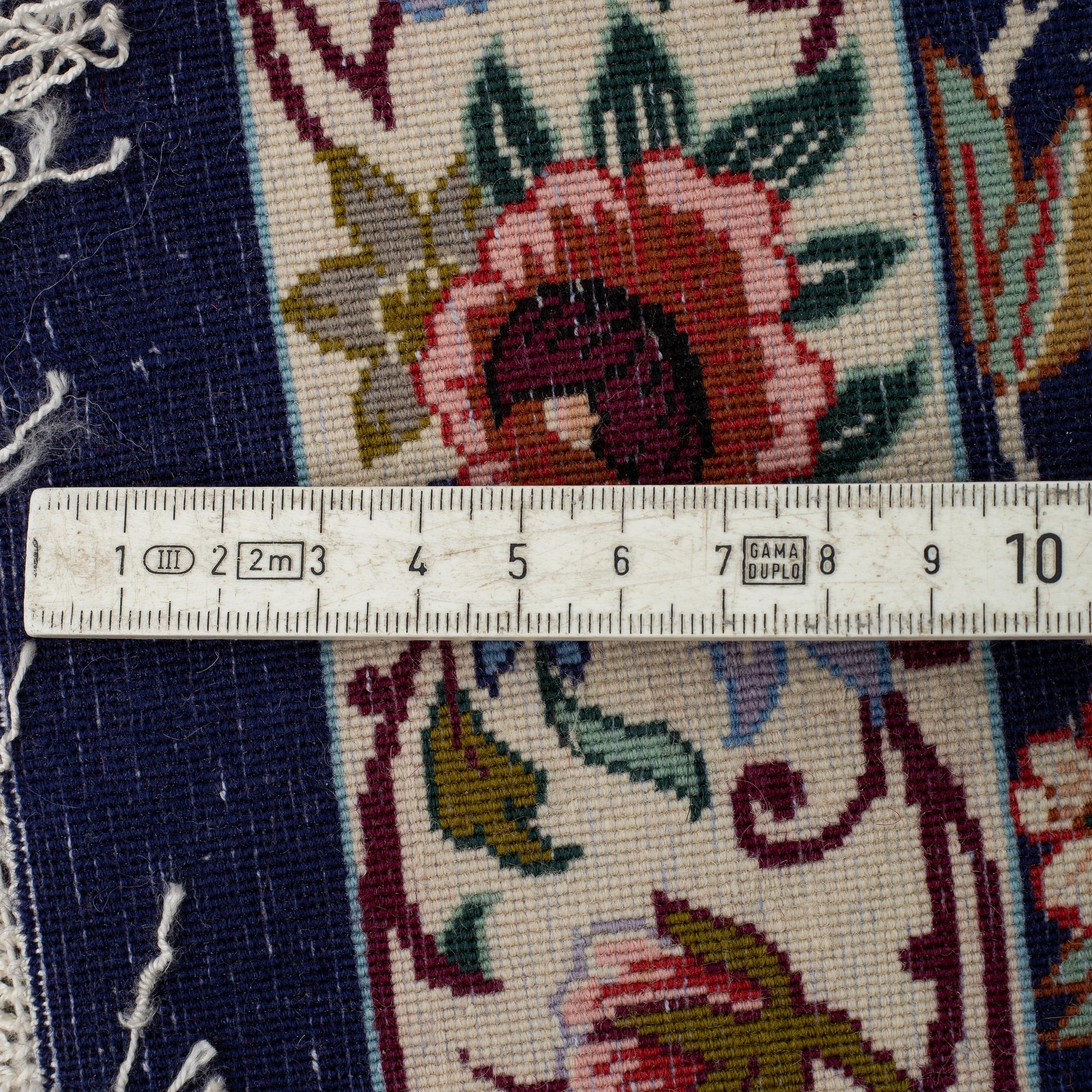 A CARPET, Esfahan, Signed Esfahan Miko Karzaadeh, around 239 x 157 cm.