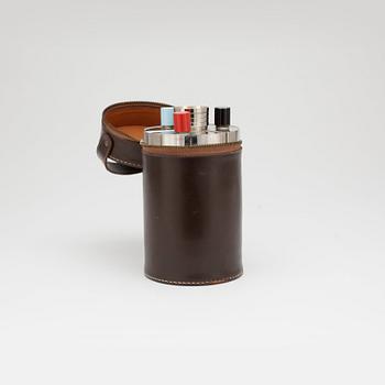 POCKET-FLASKS, three piece with accompanying glasses in brown leather casing.