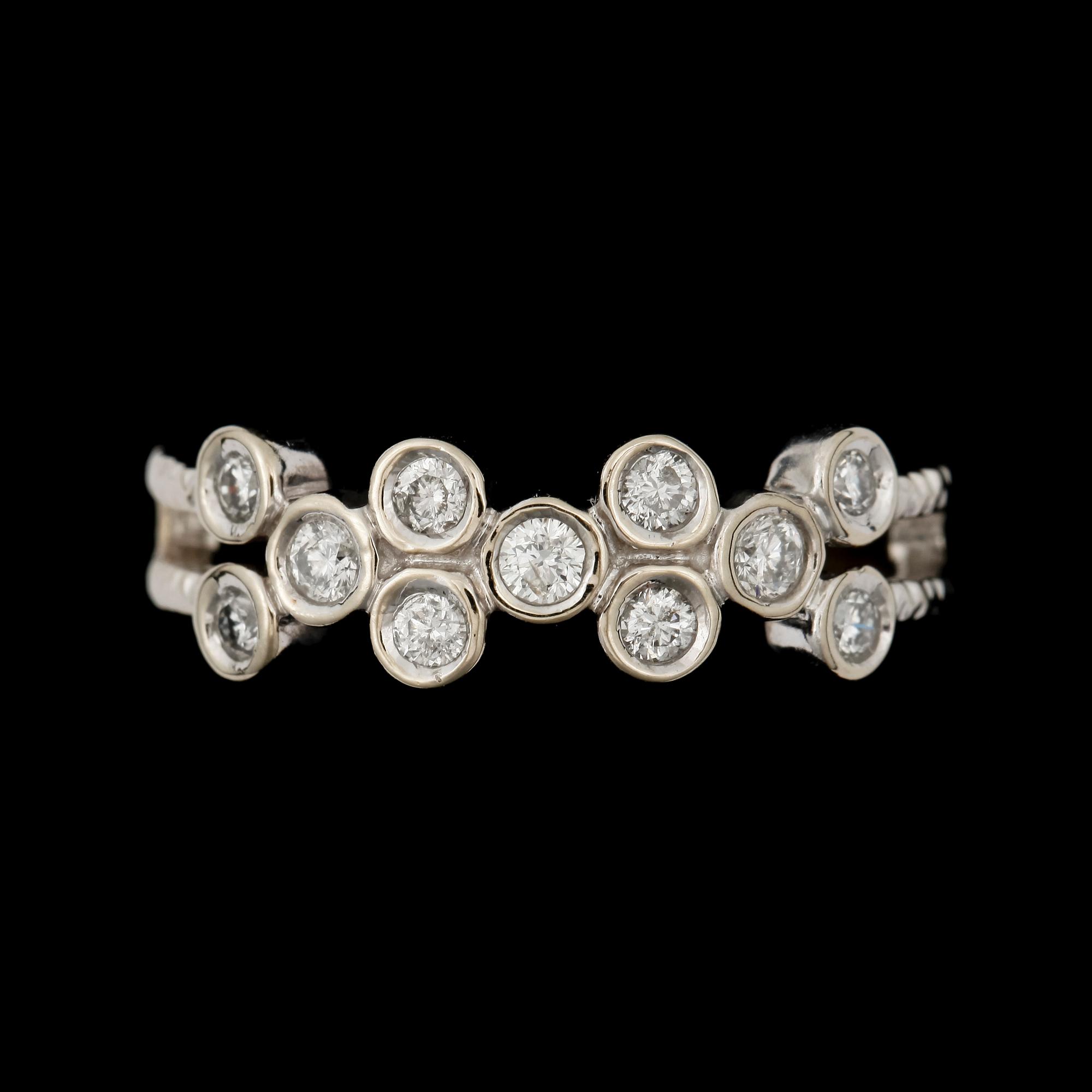 RING, 14k vitguld med briljantslipade diamanter tot ca0,55ct. 2000-tal. Vikt 3,7g.