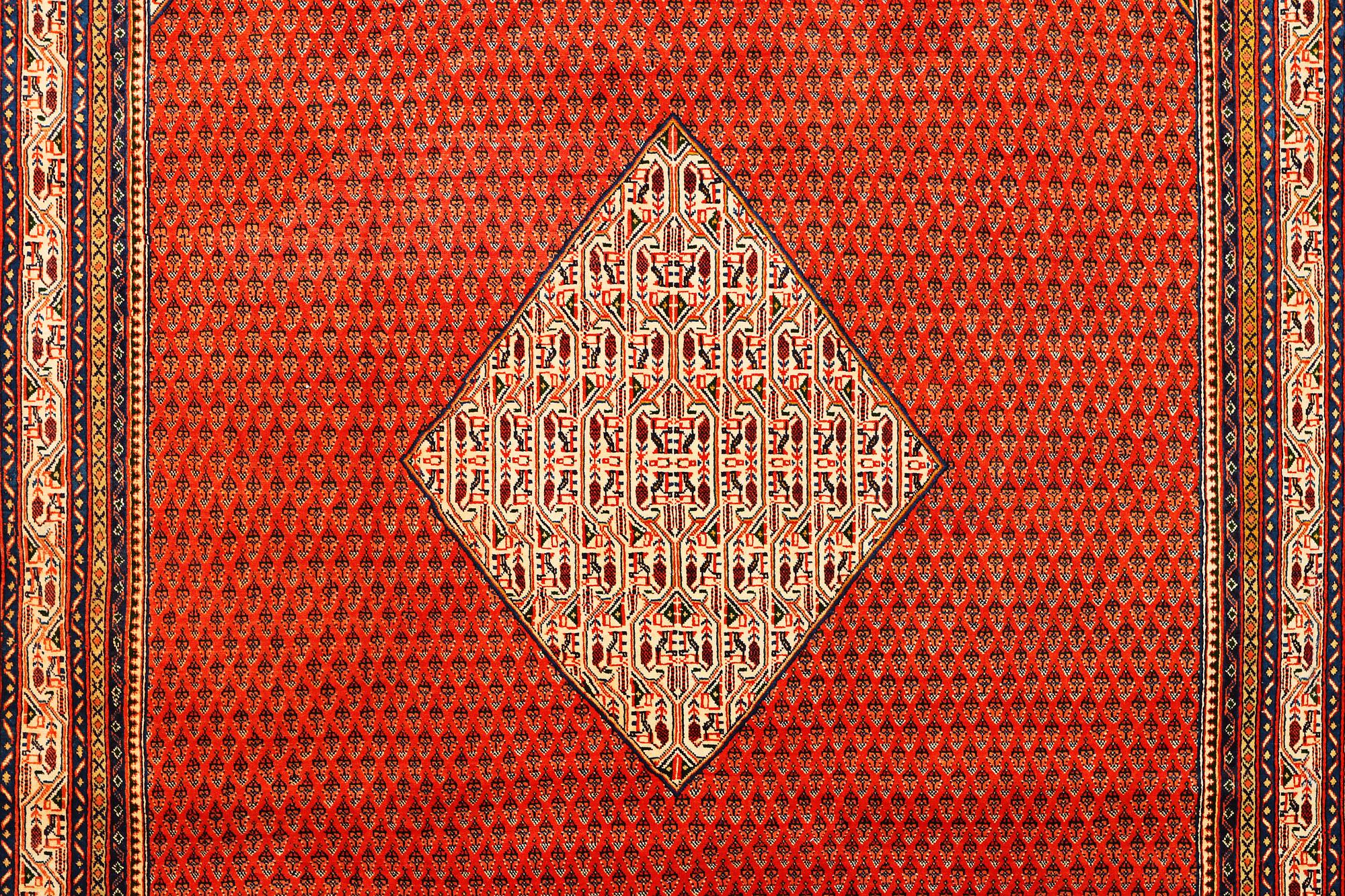 A Boteh Mir carpet, c. 346 x 242 cm.