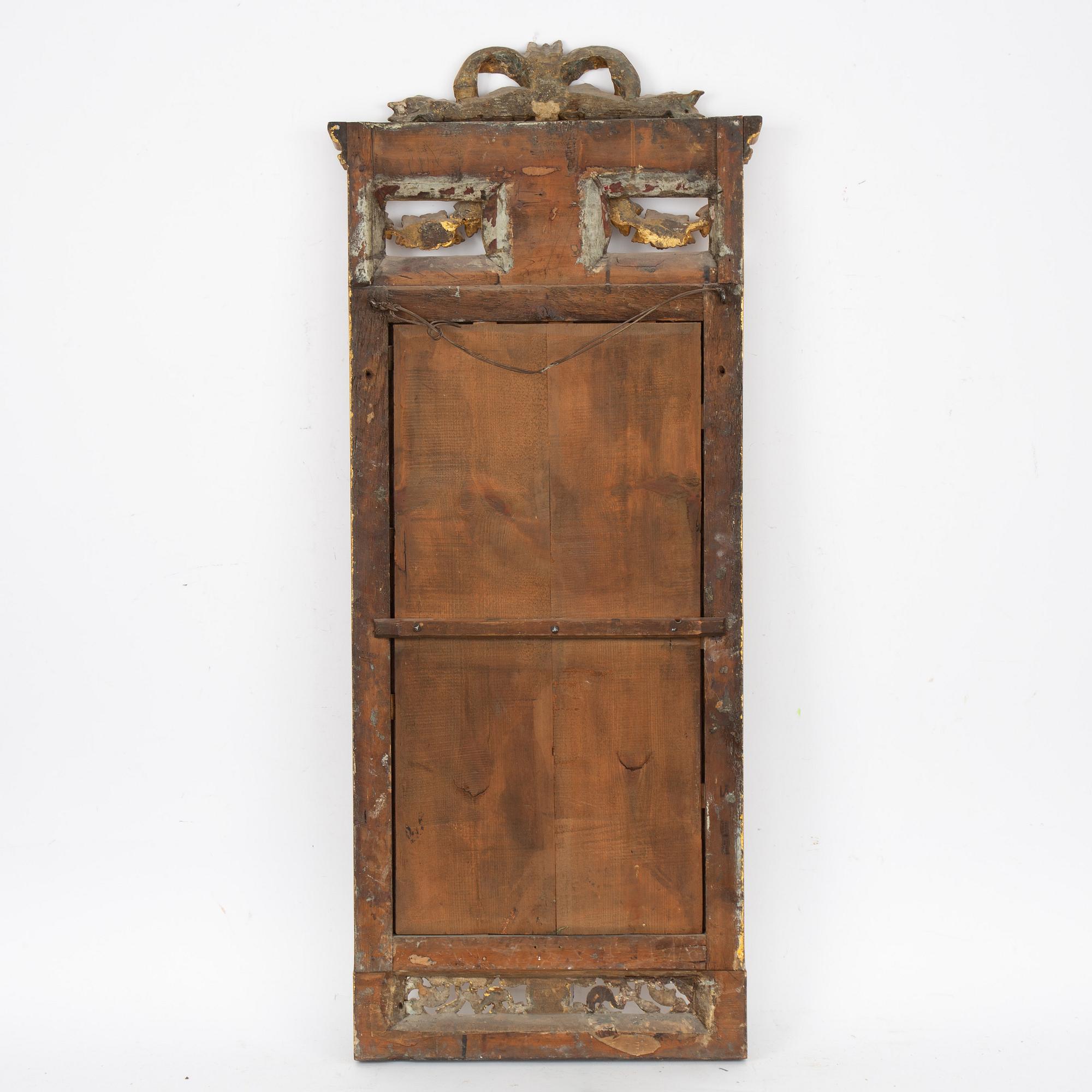 A late Gustavian giltwood mirror by J. Åkerblad (master in Stockholm 1756-99).