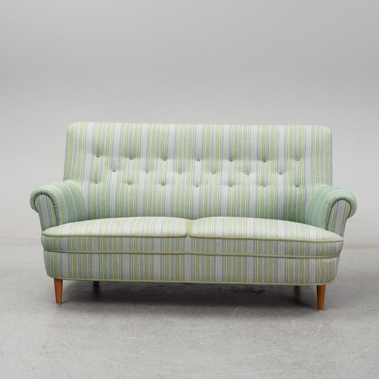 A second half of the 20th Century sofa by Carl Malmsten.