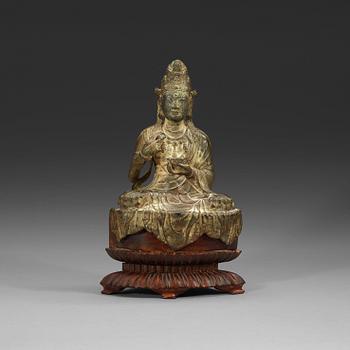 A seated bronze figure of Guanyin, Ming dynasty (1368-1644).