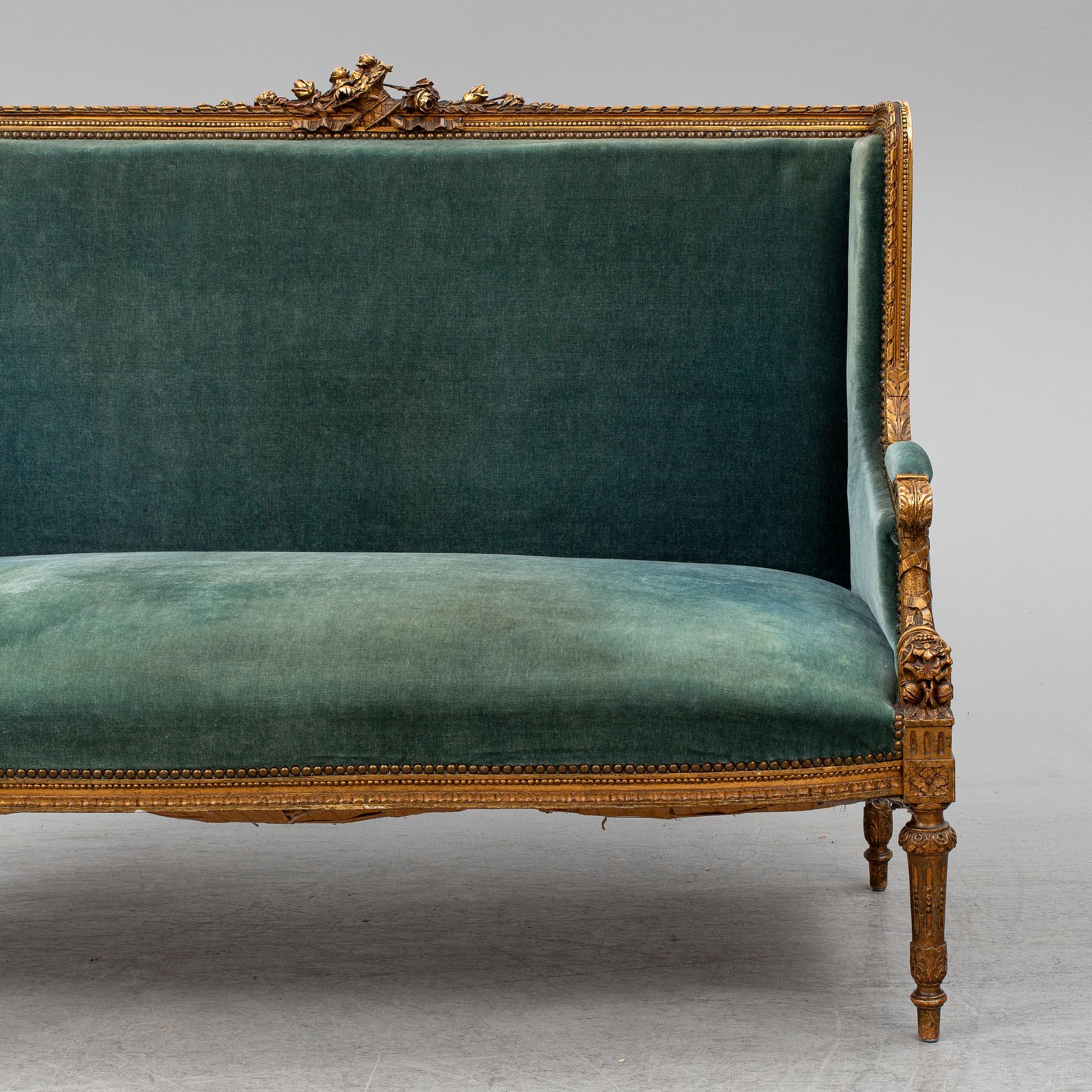A Louis XVI-style sofa, ca 1900.