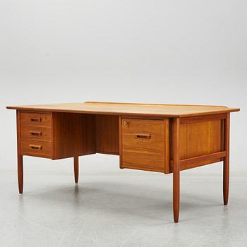 A 1950/60's teak writing desk.