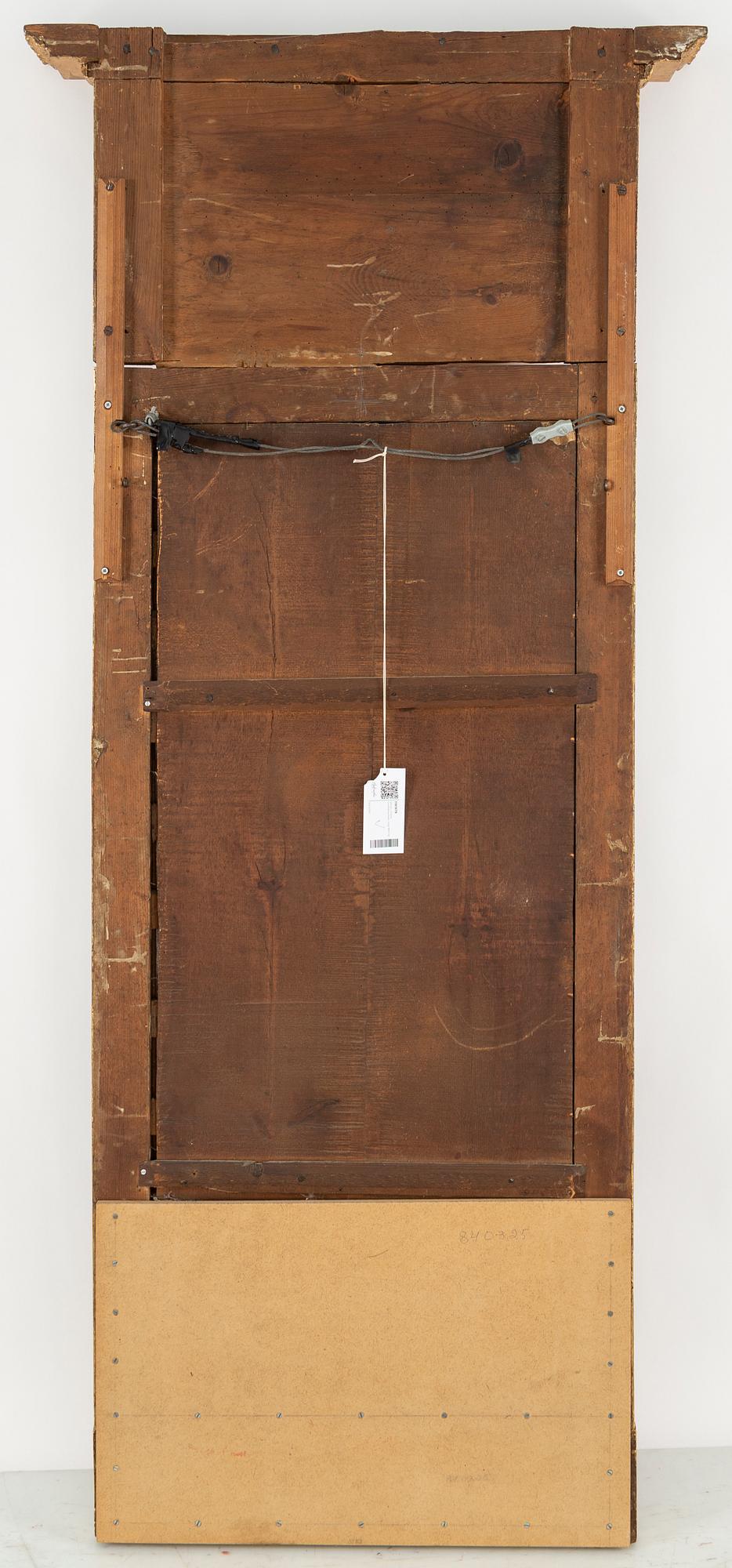 A Swedish Empire mirror, early 19th century.