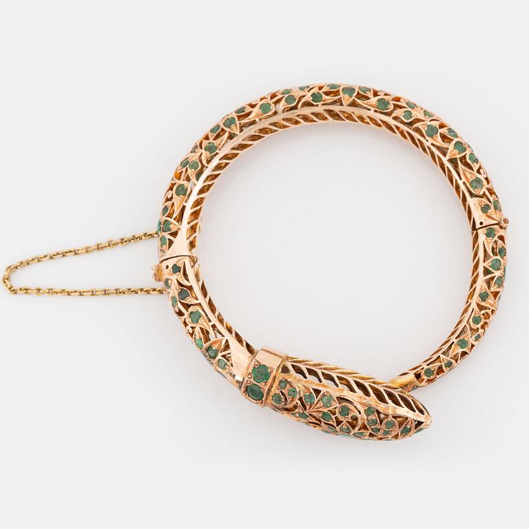 Armring,  i form av orm 14K guld med smaragder.