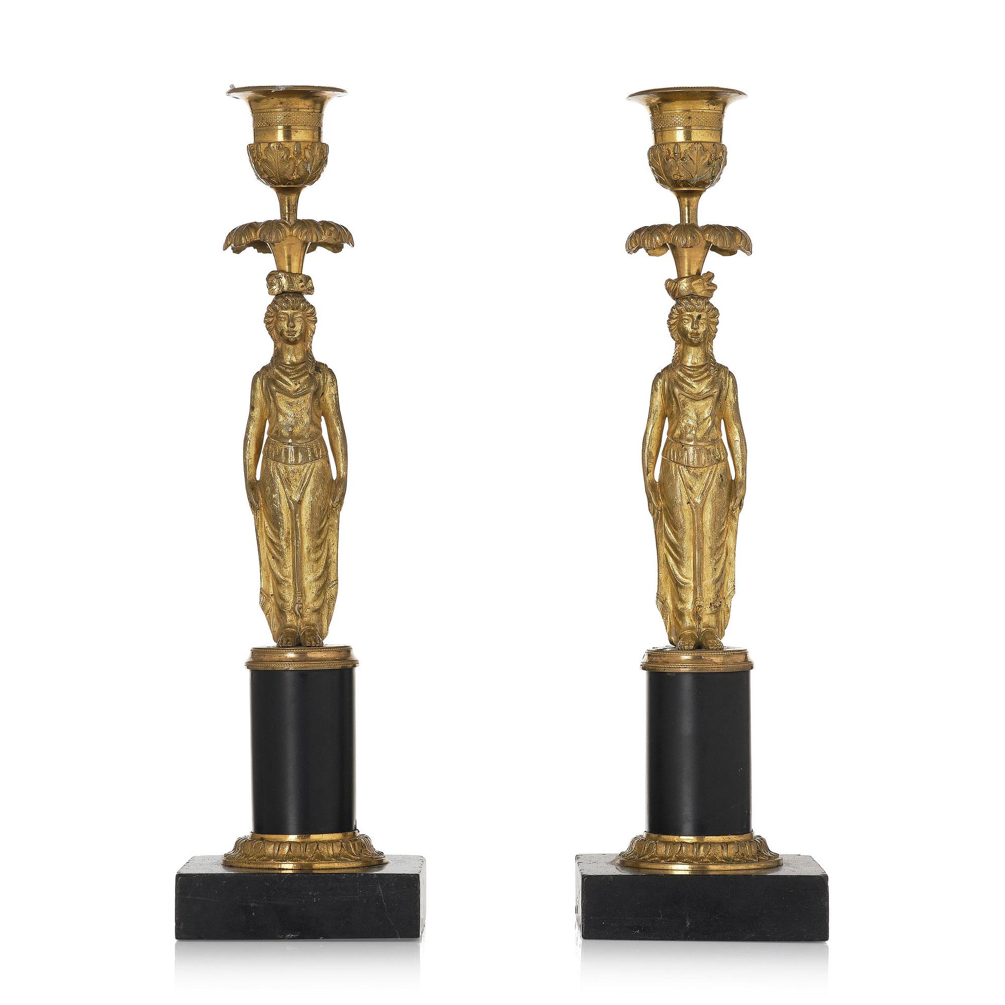 A pair of late Gustavian marble and ormolu candlesticks attributed to F. L. Rung (1758-1837).
