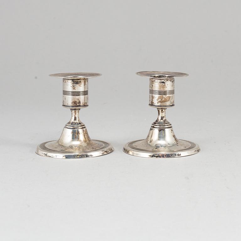 A pair of Swedish small early 19th century silver candle sticks, mark of Pehr Zethelius, Stockholm 1805.