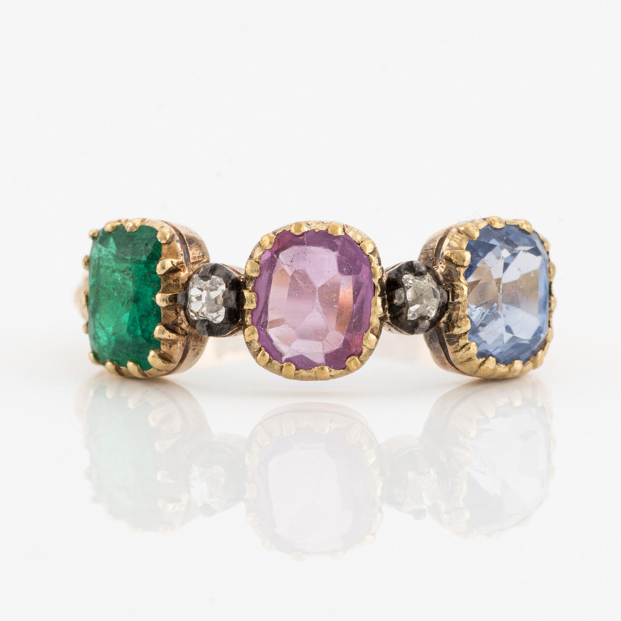 Ring in 18K gold with likely synthetic ruby, sapphire, emerald, and old-cut diamonds.