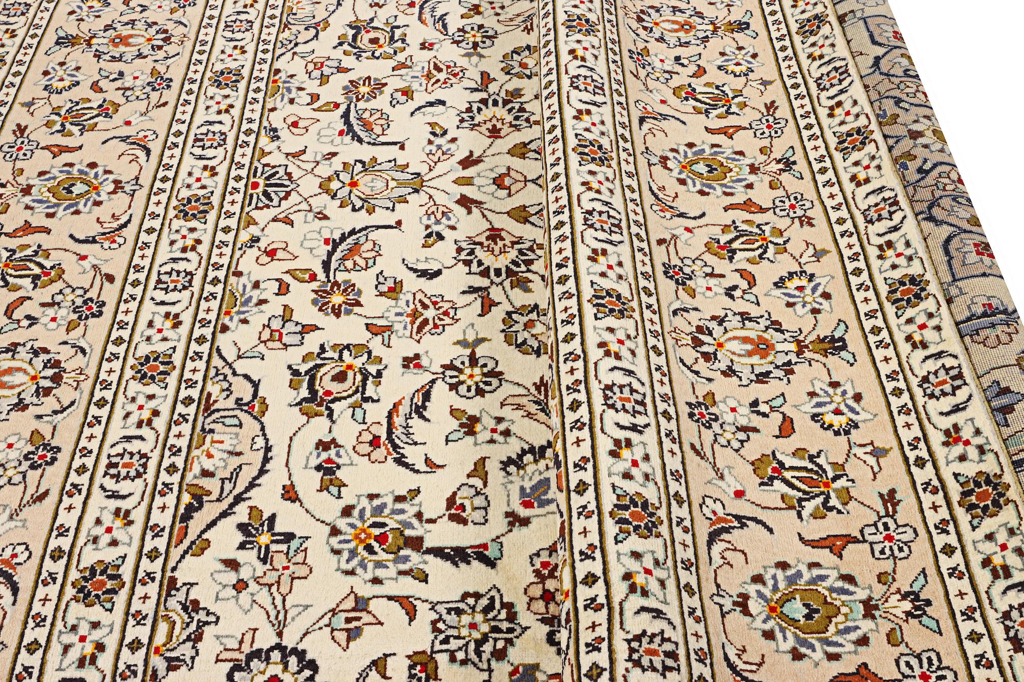 A Kashan carpet, c. 355 x 238 cm.