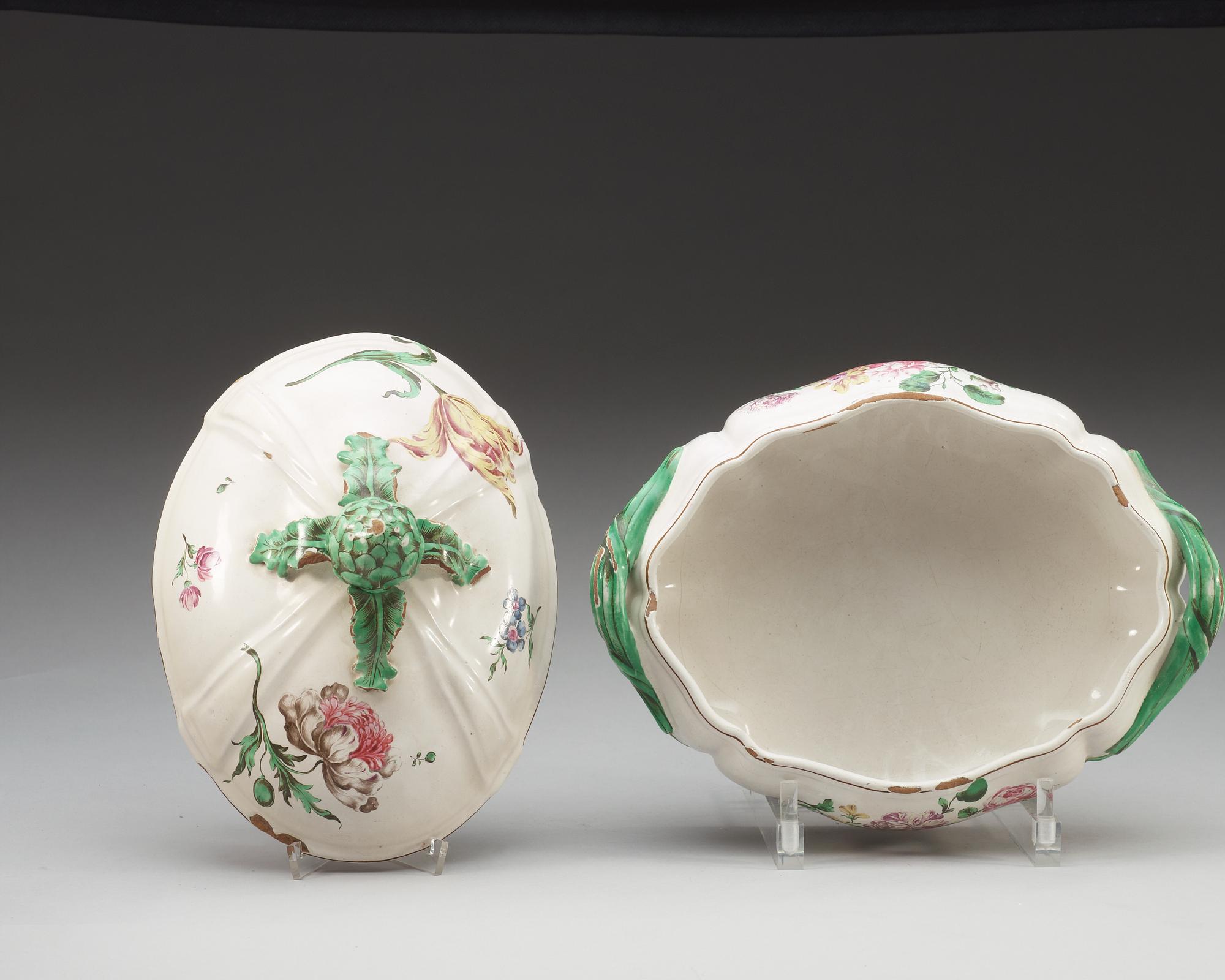 An unmarked faience tureen with cover, 18th Century.