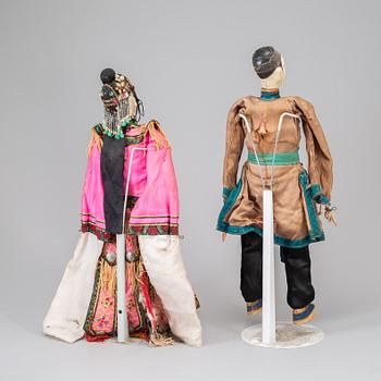 A pair of Chinese dolls, late Qing dynasty.