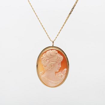 An 18K gold necklace with seashell cameo pendant 14K gold.