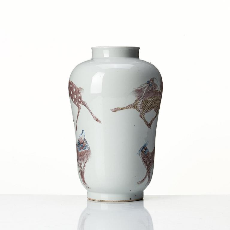 A iron red decorated vase, late Qing dynasty with seal mark to base.