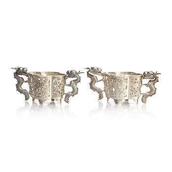 1181. A pair of  Chinese silver cup holders, 20th century.