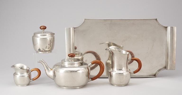 A Josef Frank four pieces pewter tea sevice and a tray by Svenskt Tenn, Stockholm 1948-53.