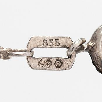 Elis Kauppi, a silver and tiger's eye pendant, Kupittaan Kulta, Turku. With chain in silver.