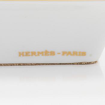 Hermès, a porcelain ashtray, France.