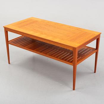 A 'Wetter' walnut coffee table by Carl Malmsten.