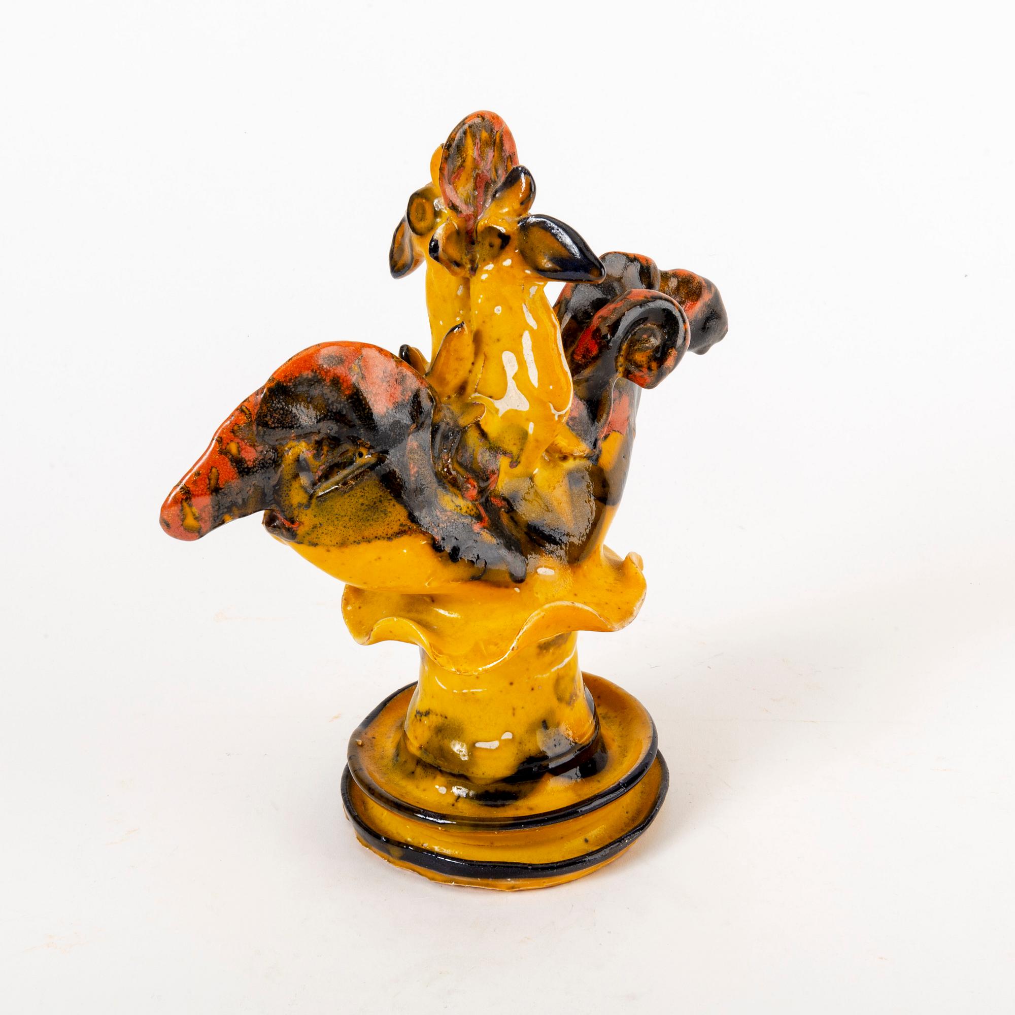 A signed Ulrica Hydman-Vallien stoneware figurine.