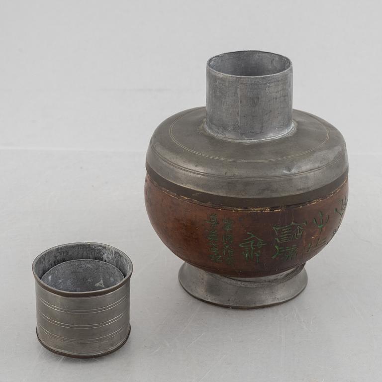 A Chinese pewter and wood tea caddie, early 20th century.