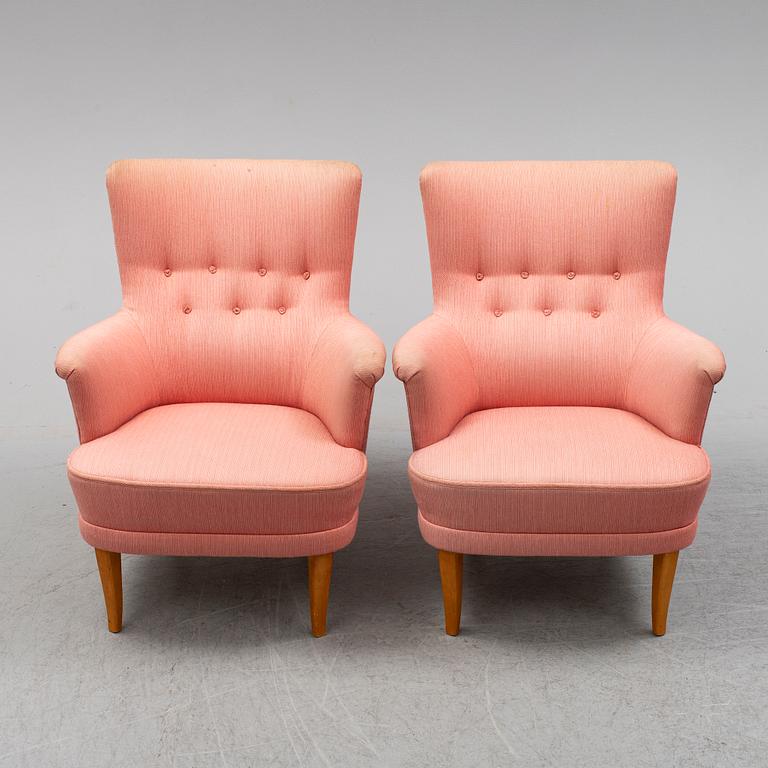 A pair of Carl Malmsten easy chairs.