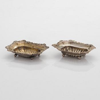 Two pairs of parcel-gilt salt cellars, latter half of the 19th century.