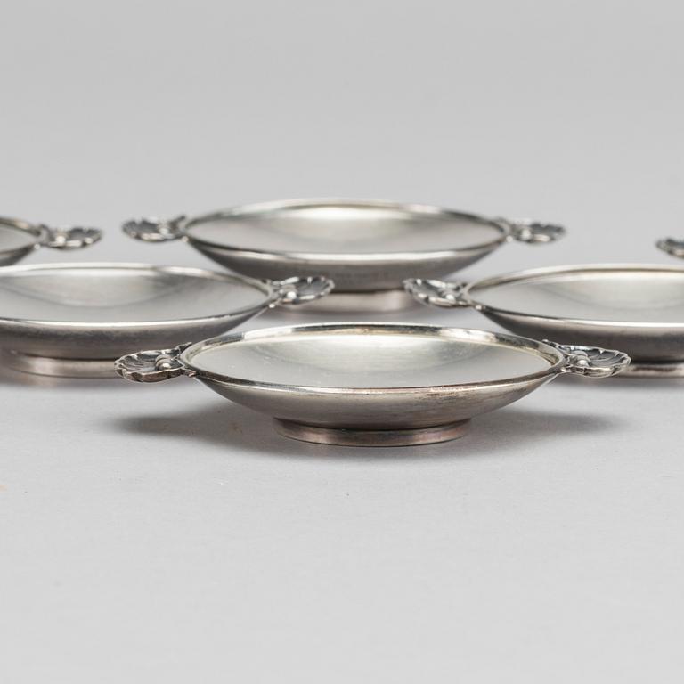 A Danish 20th century sterling set of six ashtrays, mark of G Jensen Copenhagen first half of the 19th century.