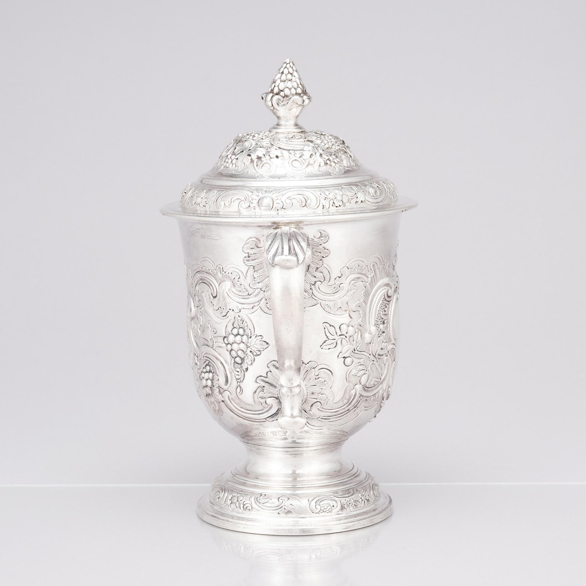 An English mid 18th century silver cup with lid, marks of Francis Crump, London.