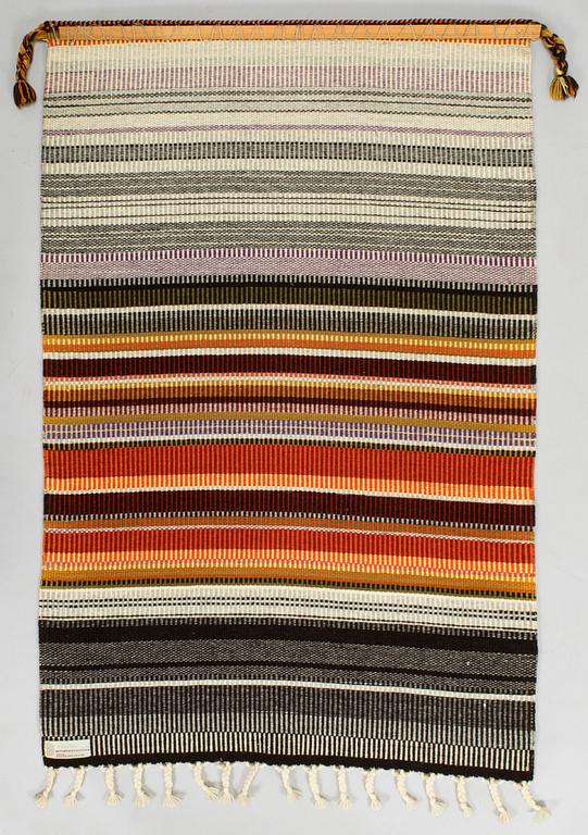 Elsa Montell-Saanio, a Raanu textile 'Campfire' from Lapland. Ca 129 x 85 cm.