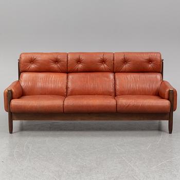 A 1960's/70's three-piece furniture suite.