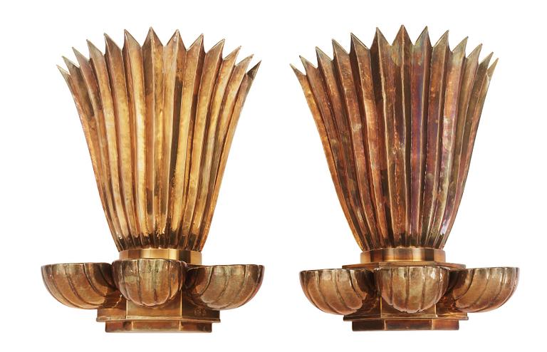 A pair of Lars Holmström Swedish Grace brass wall scones, Sweden 1920's.