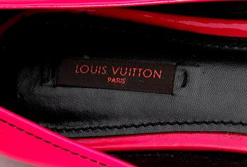 Two pair of shoes by Louis Vuitton.